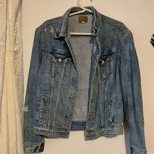 American Eagle denim Jean Jacket.  Discolored on back